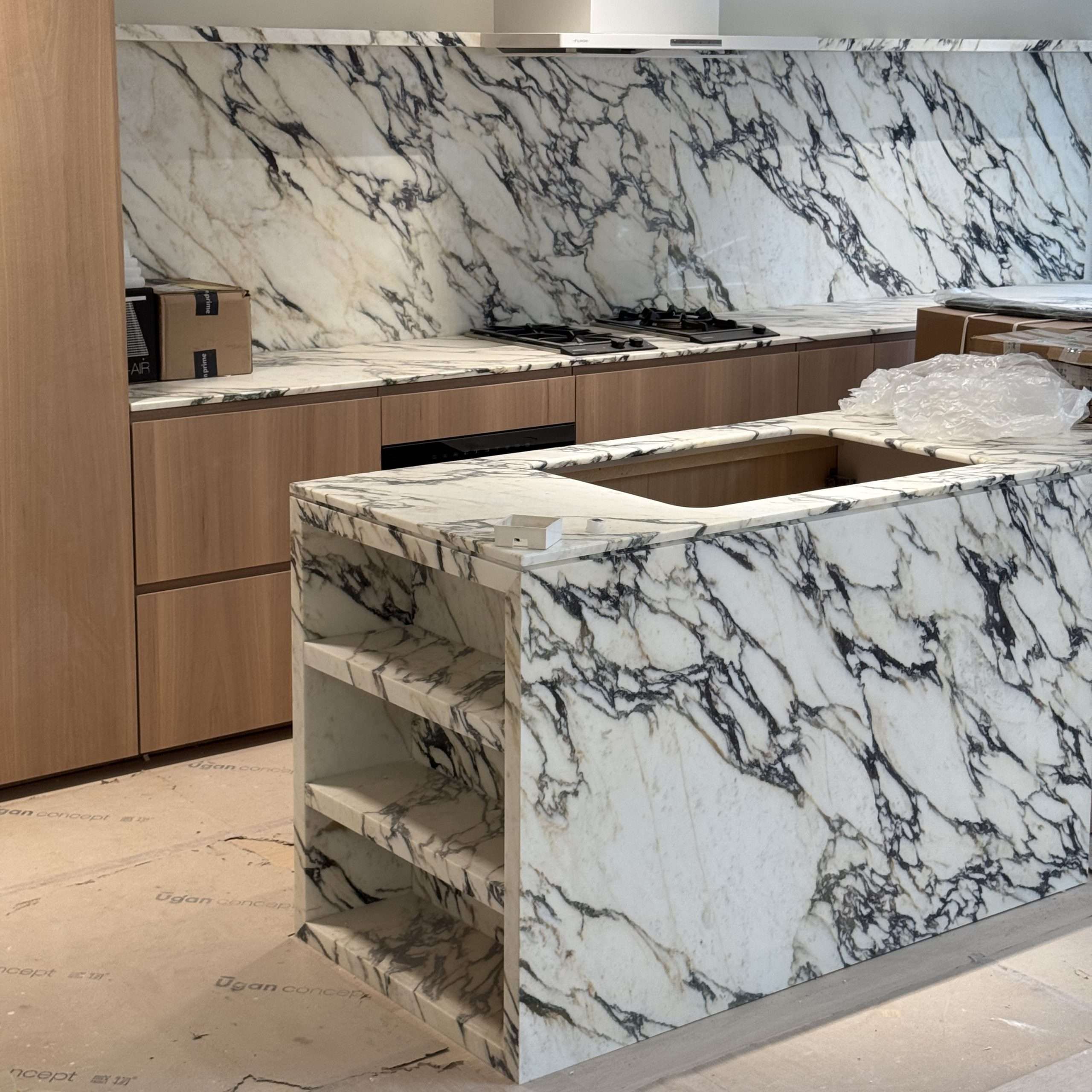 White marble kitchen island countertop with black veins polished finish